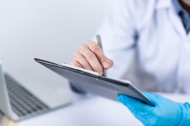 doctor taking notes