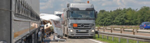 A Florida Highway auto accident involving a truck and other vehicle on a sunny day - Auto Accident Attorneys concept image 